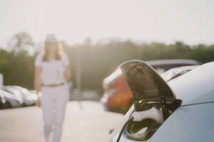 woman-charging-electro-car-at-the-electric-gas-sta-2024-12-06-08-28-33-utc (1)