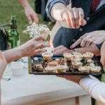 group-of-friends-eating-finger-food-at-a-Catering wedding-r-2025-03-09-04-13-50-utc (1)