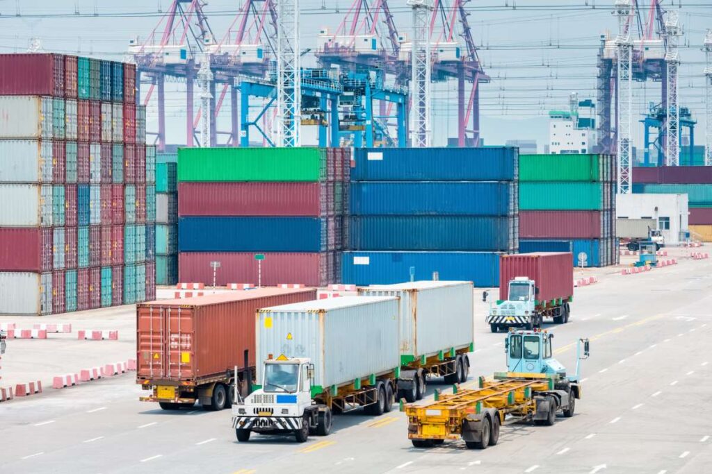 busy container terminal closeup, brisk trade and economic growth concept